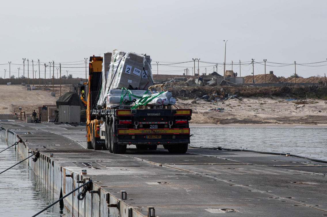 A truck carries humanitarian aid across Trident Pier, a temporary pier to deliver aid, off the Gaza Strip, amid the ongoing conflict between Israel and the Palestinian Islamist group Hamas, near the Gaza coast. (File/Reuters)