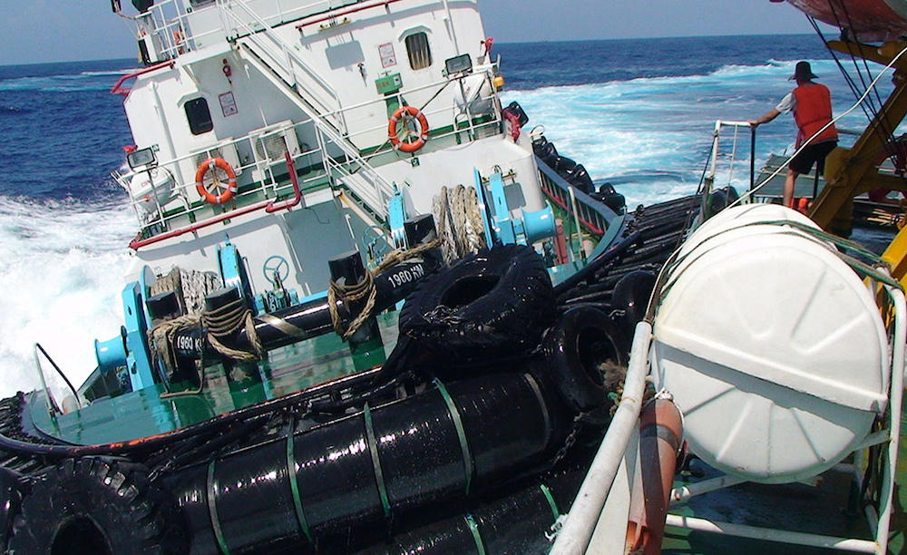 The two Communist-ruled neighbors have been embroiled in a years-long maritime dispute in the South China Sea. Above, a Chinese boat, left, rams a Vietnamese vessel in contested waters in the South China Sea in this 2014 photo. (AFP file photo)