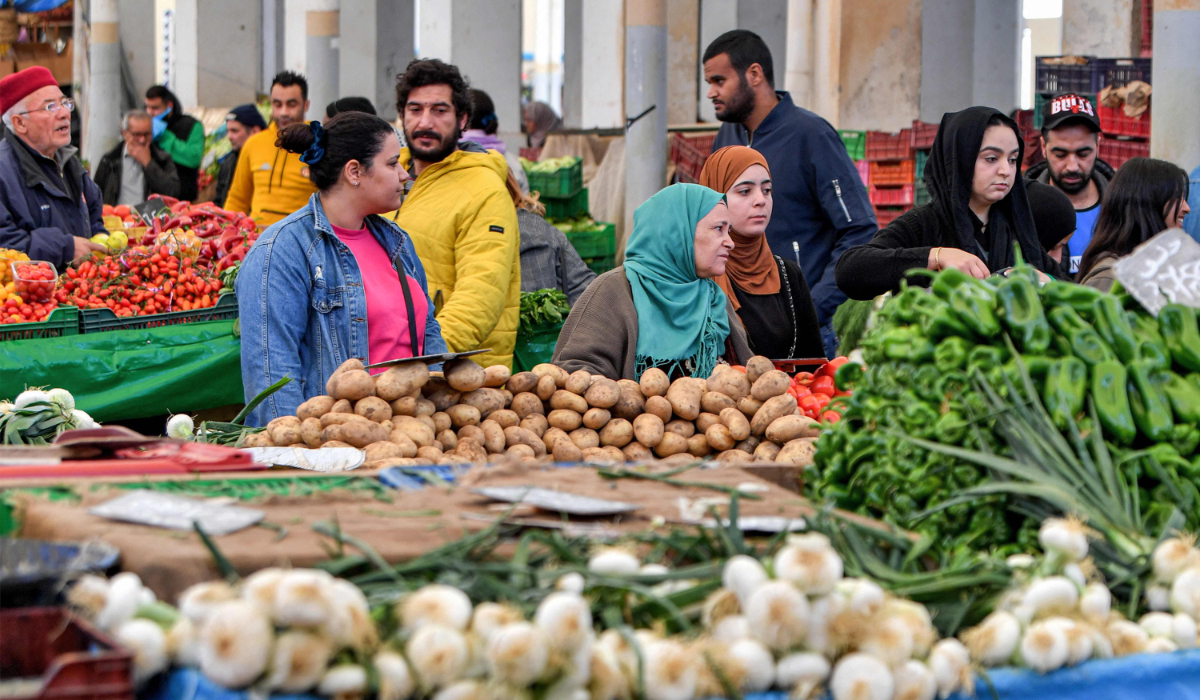 People shop for produce at the Central Market in Tunis. (AFP file photo)