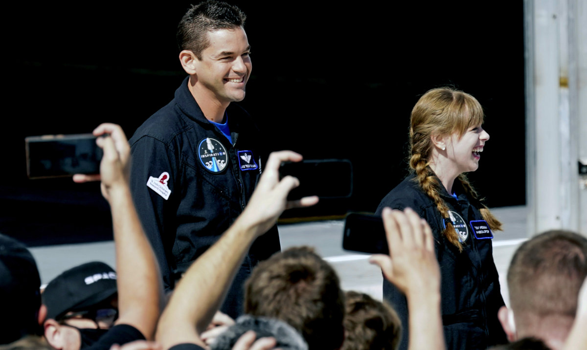 Jared Isaacman, left, and Hayley Arceneaux prepare to head to launchpad 39A for a launch on a SpaceX Falcon 9 at the Kennedy Space Center in Cape Canaveral, Fla. New research presents the largest set of information yet regarding how the human body reacts to spaceflight. (AP/File)