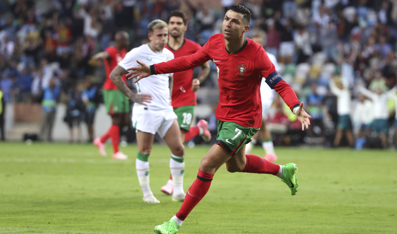 Portugal’s Cristiano Ronaldo celebrates after scoring against Ireland during a friendly soccer match against Ireland at the Aveiro Municipal stadium in Aveiro, Portugal, Tuesday, June 11, 2024. (AP)
