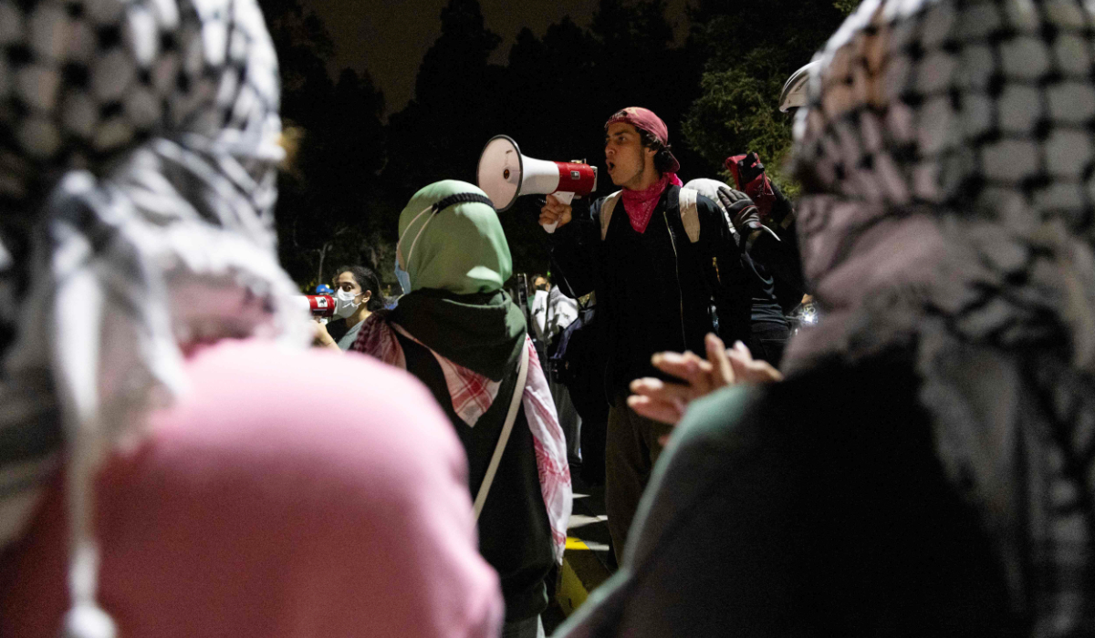 Pro-Palestinian protesters demonstrate facing law enforcement outside Dodd Hall in the University of California Los Angeles (UCLA) in Los Angeles, June 10, 2024. (AFP)