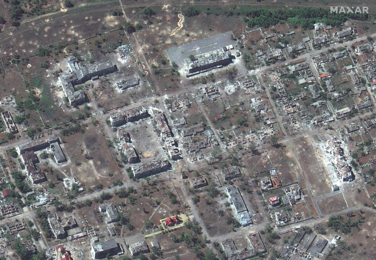 This satellite image released by Maxar Technologies shows buildings destroyed in Rubizhne, Ukraine, amid Russia's invasion. Carbon dioxide emissions are expected to jump drastically when Ukraine starts reconstruction work. (AFP)