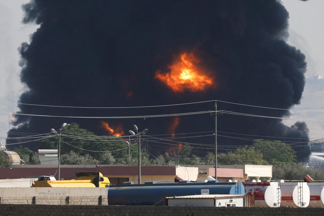 Smoke rises following a fire at an oil refinery, on the outskirts of Irbil, Iraq, June 13, 2024. (REUTERS)
