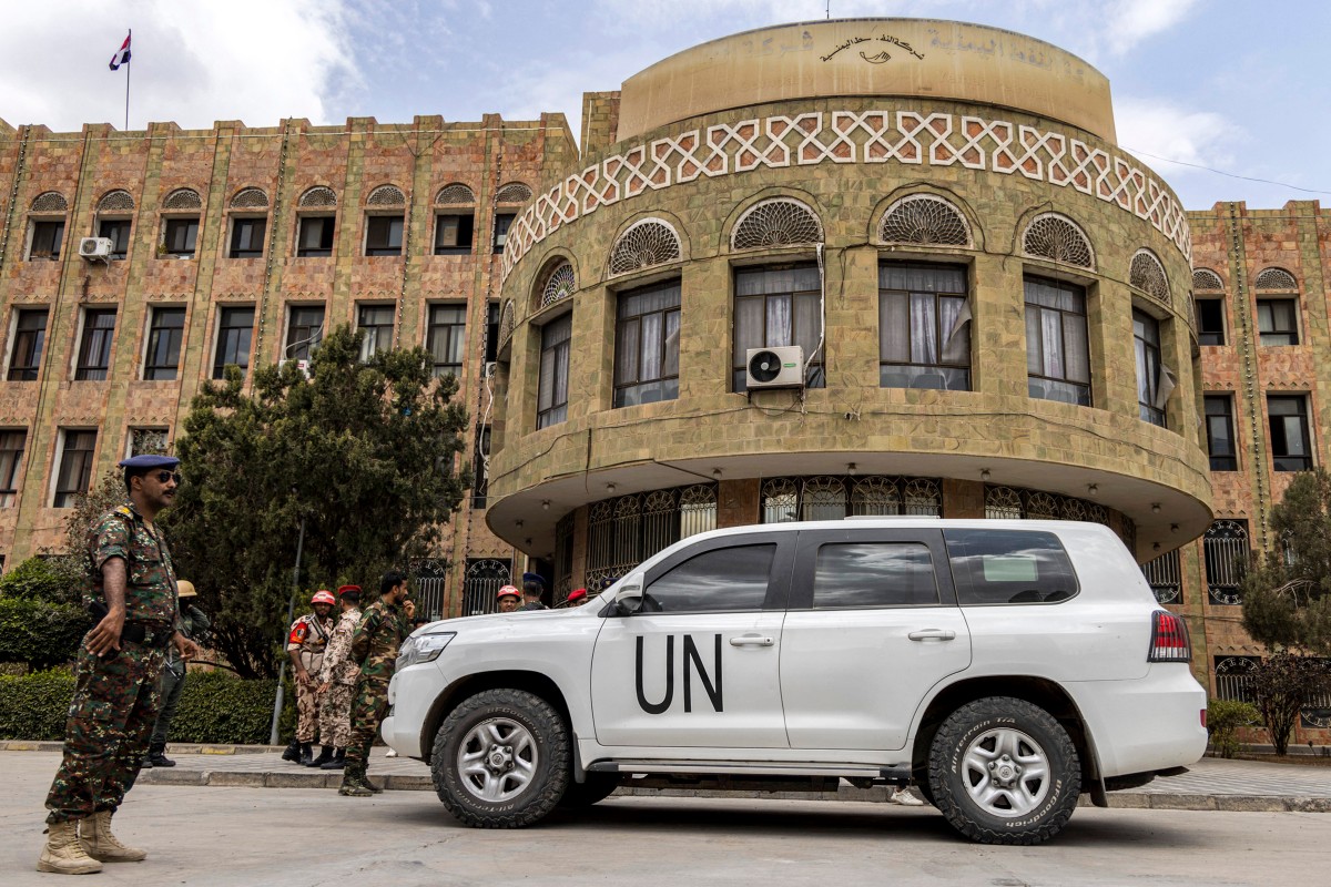 A United Nations vehicle is parked outside as the UN special envoy for Yemen meets with local officials in the country's third city of Taez (AFP)