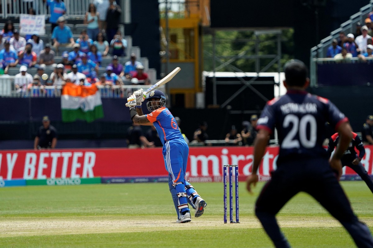 India's Suryakumar Yadav plays a shot on his way to hiiting a half-century during the ICC men's Twenty20 World Cup 2024 group A cricket match between the USA and India at Nassau County International Cricket Stadium in East Meadow, New York (AFP)
