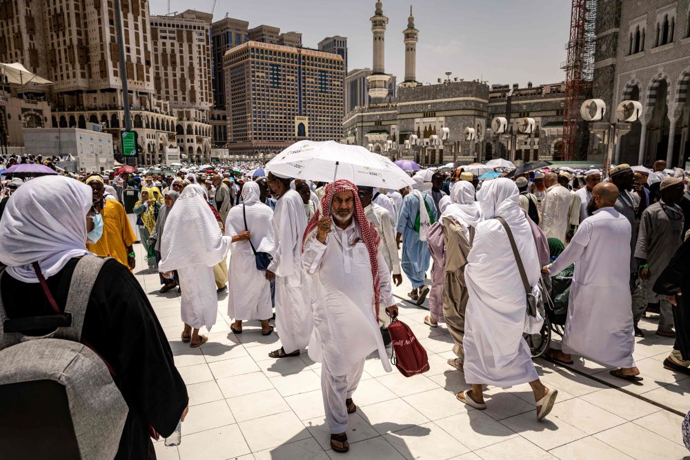Muslim pilgrims arrive in Saudi Arabia’s holy city of Makkah on June 11, 2024, ahead of the annual Hajj pilgrimage. (AFP)