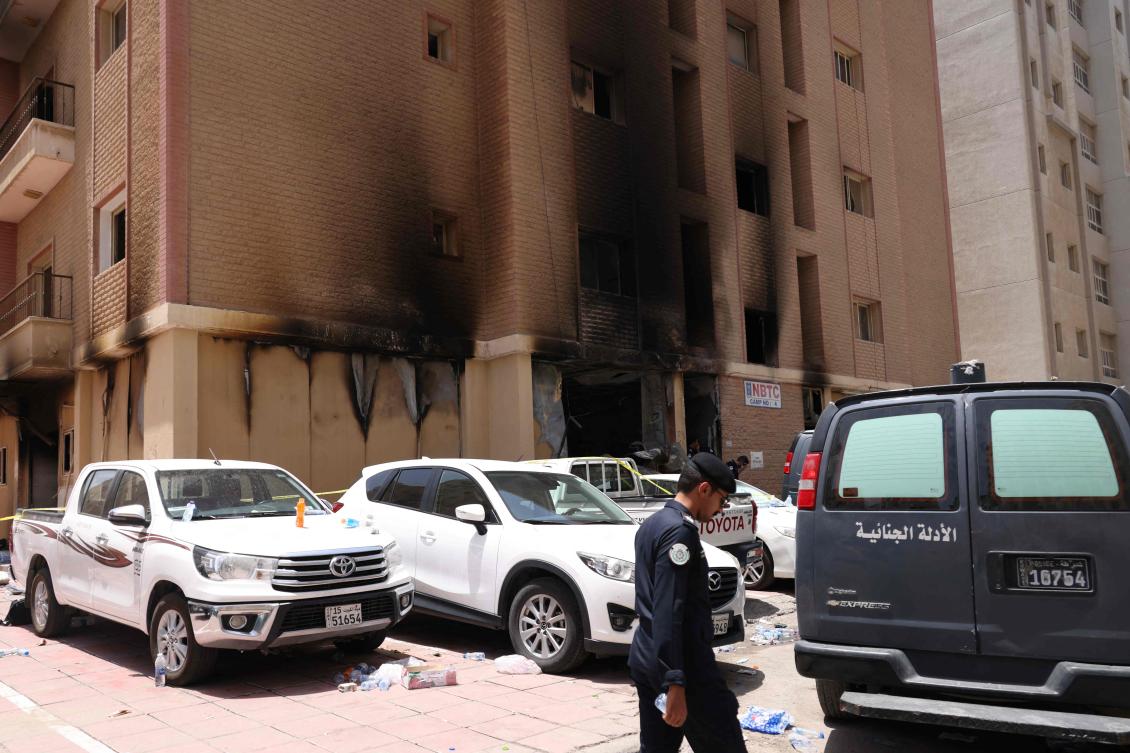 Wednesday’s dawn blaze quickly engulfed a housing block home to some of the many foreign laborers servicing the oil-rich gulf state’s economy. (AFP)