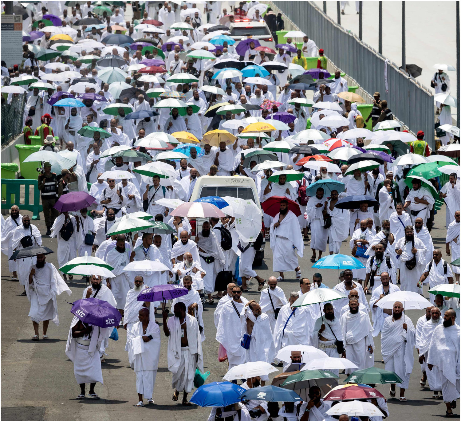 Hajj pilgrims arrive on June 14, 2024, at the tent city of Mina, near the holy city of Makkah, as the annual pilgrimage begins in exhausting summer heat. (AFP)