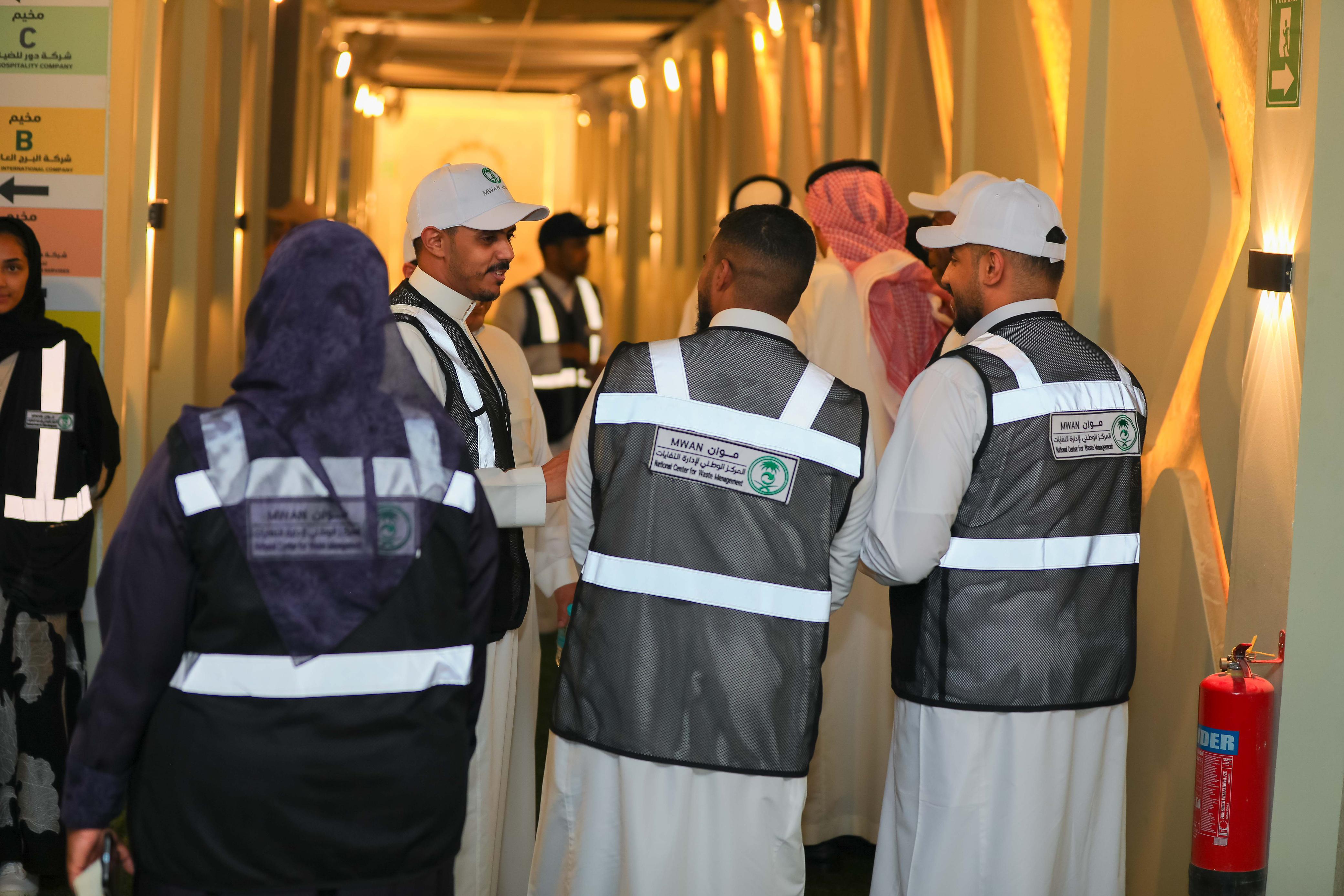 A MWAN outreach team visits Mina to ensure the full readiness of the “Sustainable Ihram” initiative. (Supplied)
