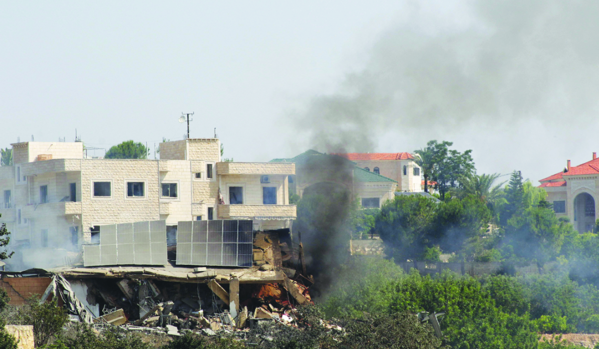 Black smoke billows from a fire caused by an Israeli airstrike on Jennata east of the southern Lebanese port city of Tyre on June 14, 2024. (AFP)