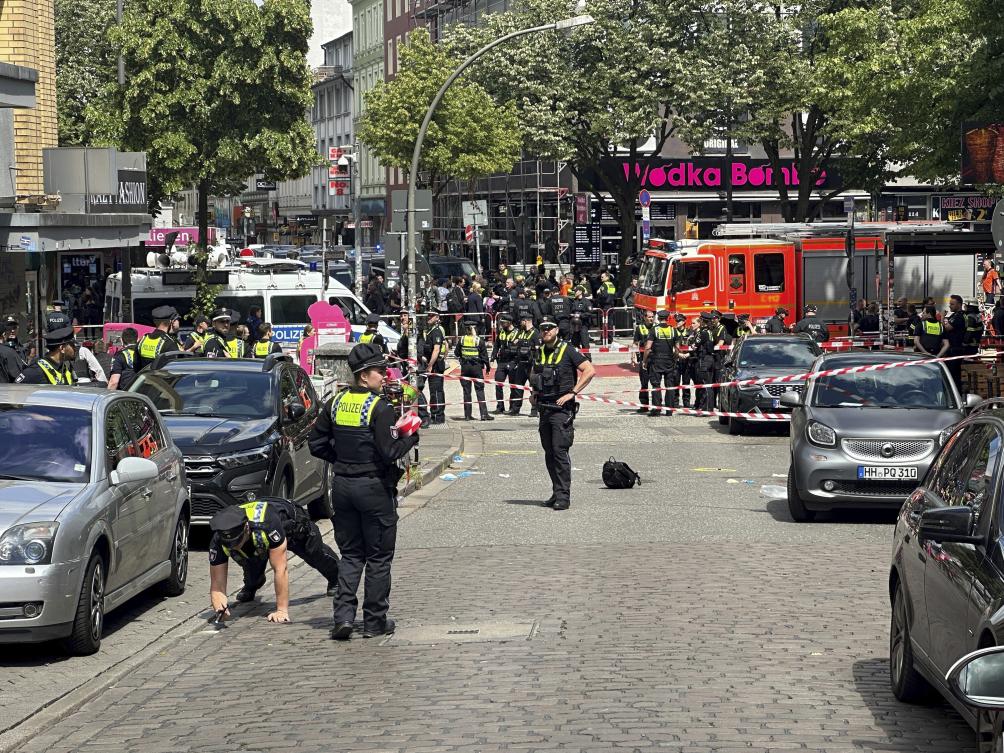 Police cordon off an area near the Reeperbahn in Hamburg, Germany on June 16, 2024. (dpa via AP)