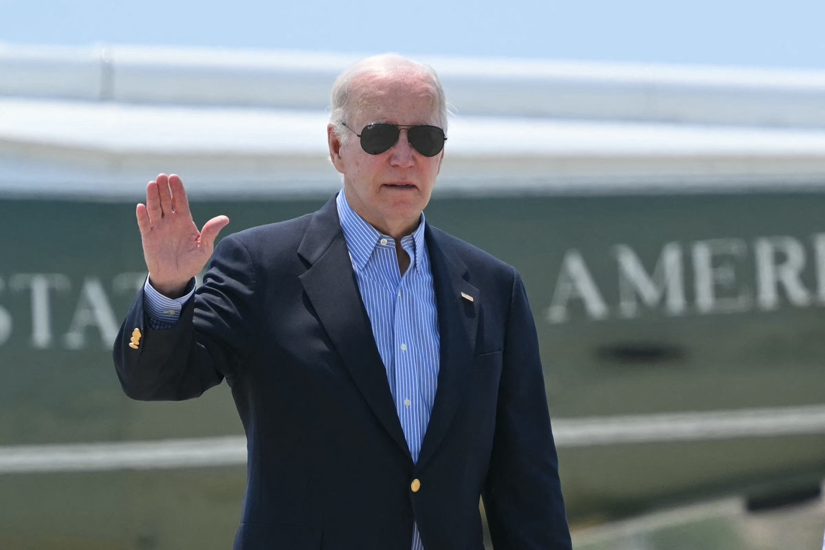 US President Joe Biden prepares to board Air Force One at Los Angeles international in California on June 16, 2024. (AFP)