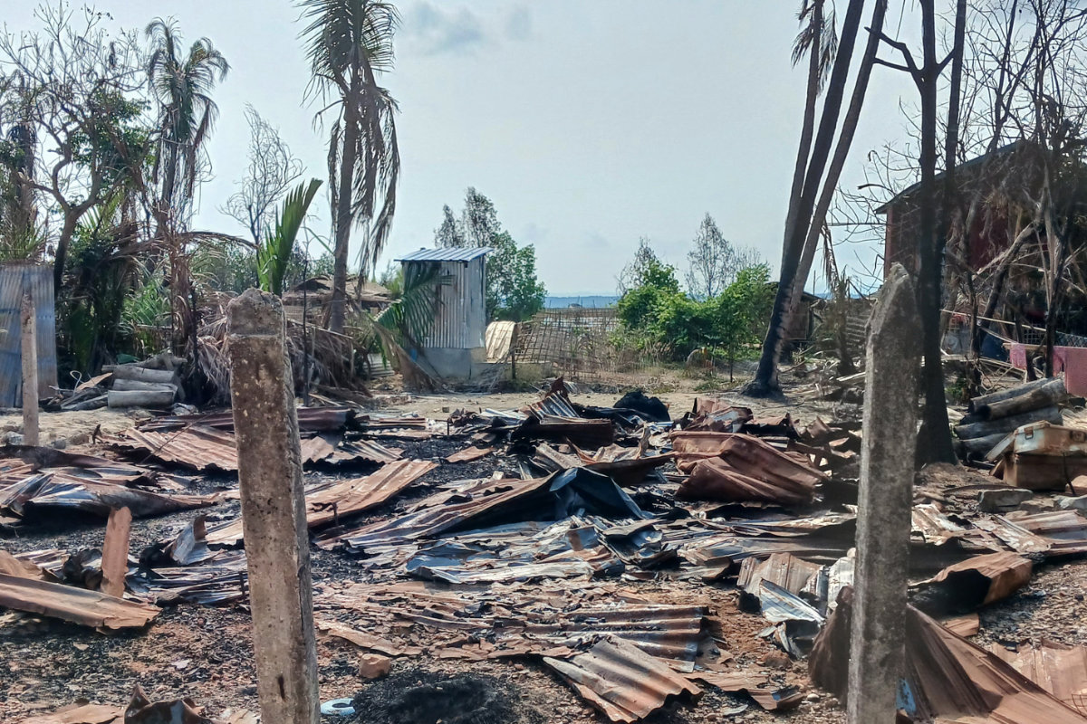 This photo taken on May 21, 2024 shows a destroyed house and burned trees following fighting between Myanmar's military and the Arakan Army ethnic minority armed group in a village in Minbya Township in western Rakhine State. (AFP)