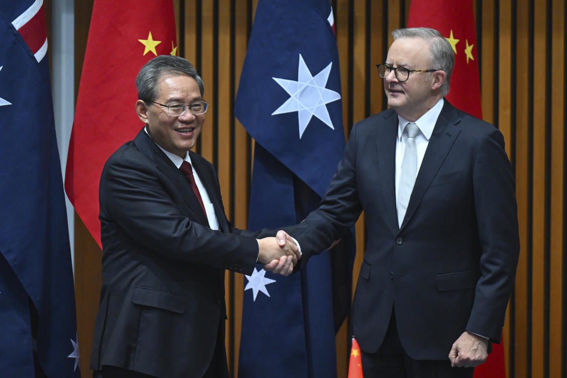 Chinese Premier Li Qiang, left, and Australia’s Prime Minister Anthony Albanese at a signing ceremony at Parliament House in Canberra on June 17, 2024. (Pool AAP Image)