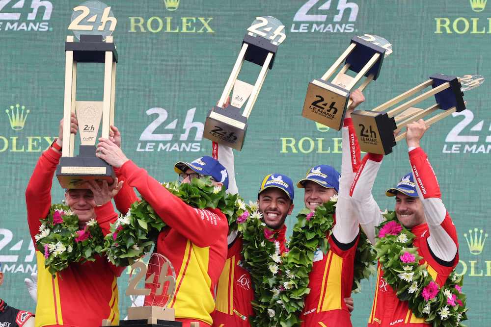 From left: errari Endurance program manager Antonello Coletta, Head of Endurance Cars Ferdinado Cannizzo and Ferrari 499P Hybrid Hypercar WEC’s drivers Antonio Fuoco, Nicklas Nielsen and Miguel Molina after winning the Le Mans 24-hours endurance race on June 16, 2024. (AFP)