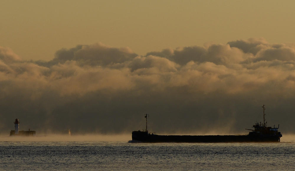 Above, a ship makes it ways through heavy morning fog towards the Baltic Sea on Nov. 3, 2012. Russia sends about a third of its seaborne oil exports through the Danish straits. (AFP)