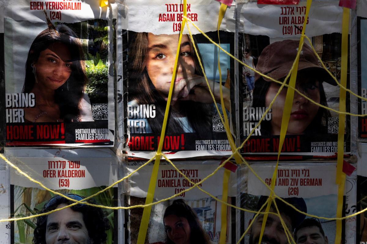 Posters of hostages, kidnapped during the deadly October 7 attack on Israel by Hamas, hang amid the ongoing Israel-Hamas conflict, in Tel Aviv, Israel, June 17, 2024. (Reuters)