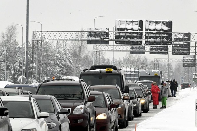 Finland's parliament will be able to accept a government proposal to temporarily reject asylum seekers arriving across the border from Russia if some amendments are made, an influential committee of legislators said on Tuesday. (AFP/File)