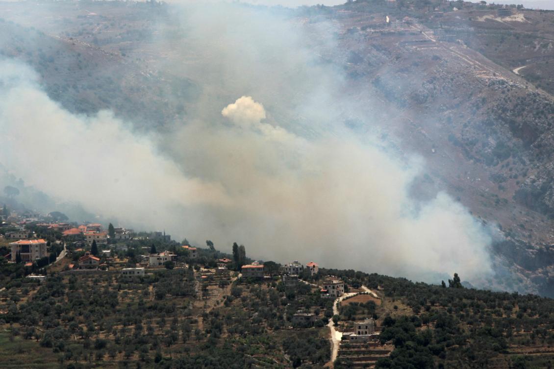 Smoke billows from fires ignited by Israeli shelling on the forested areas of the southern Lebanese village of Deir Mimas on Jun. 15, 2024, amid ongoing cross-border clashes between Israeli troops and Hezbollah fighters. (AFP)