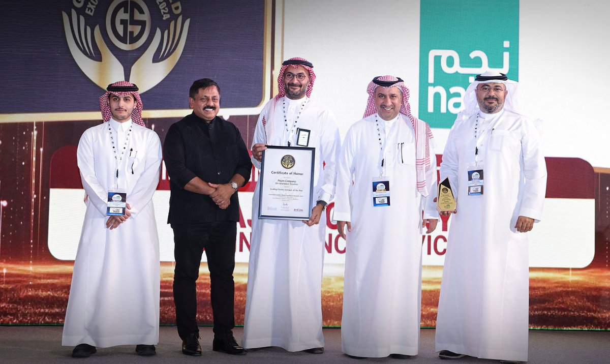 Senior management members of Najm receive the award in Riyadh.