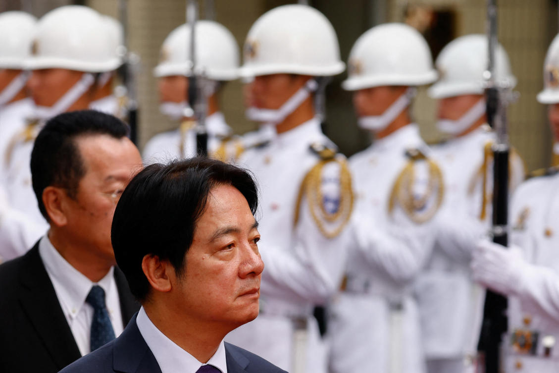 Taiwan President Lai Ching-te said that ‘peace must rely on strength, which is to say avoiding war by preparing for war to achieve peace.’ Above, Lai troops the line in Kaohsiung on June 16, 2024. (Reuters)