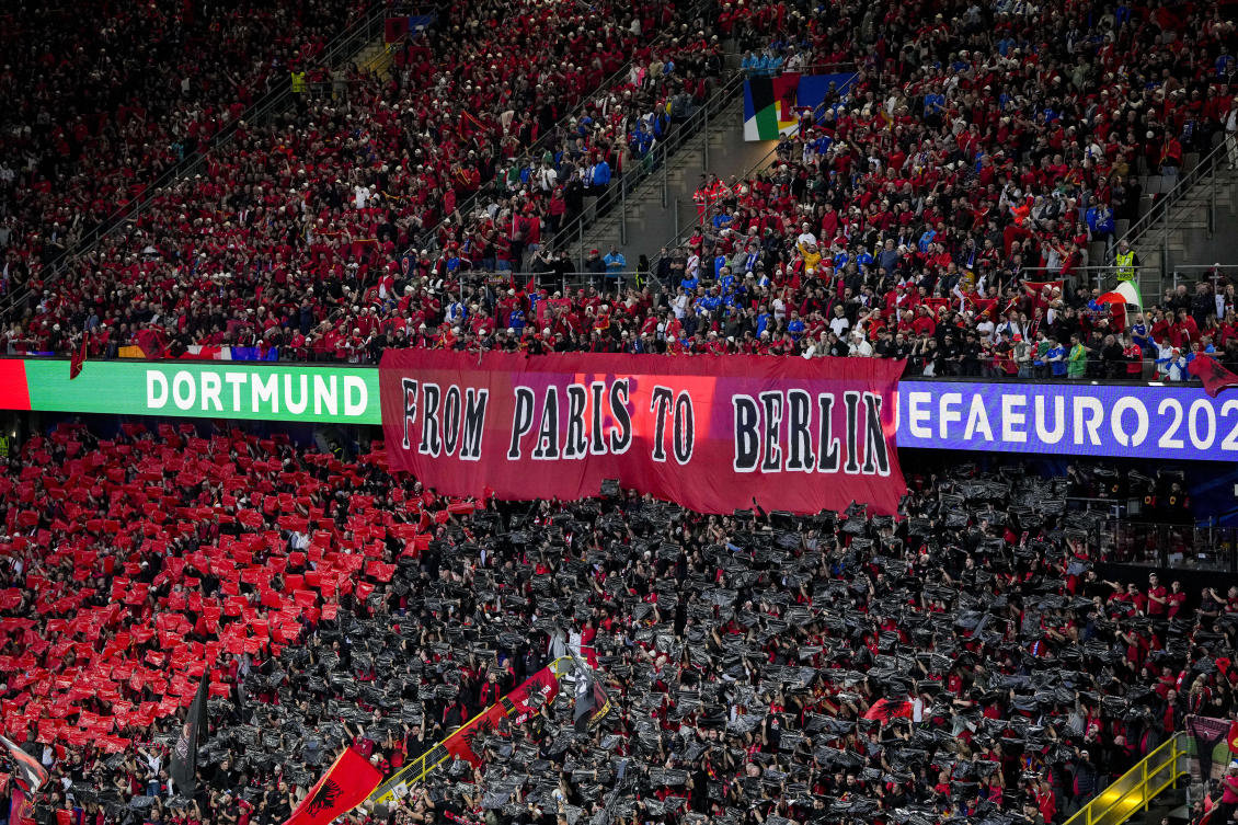 Albanian fans hold a banner during a Group B match between Italy and Albania at the Euro 2024 soccer tournament in Dortmund on Jun. 15, 2024. (AP)