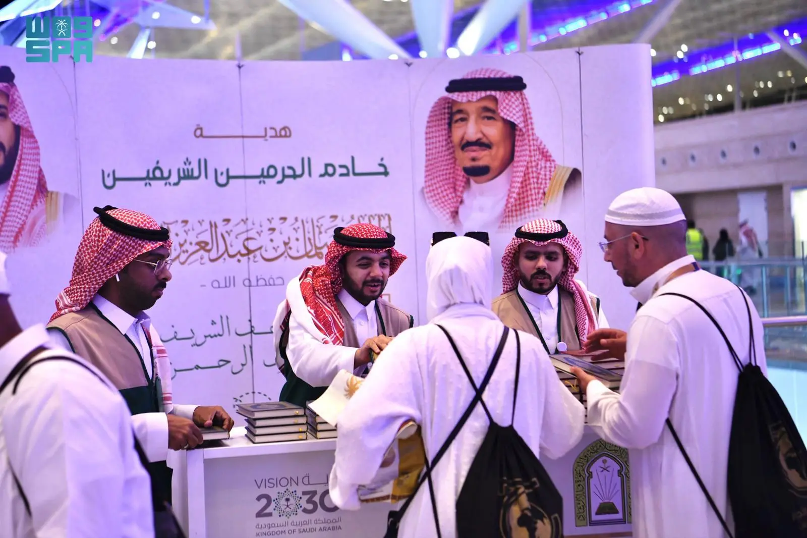 Saudi authorities are distributing 646,652 copies of the Qur’an to departing Hajj pilgrims. (SPA)