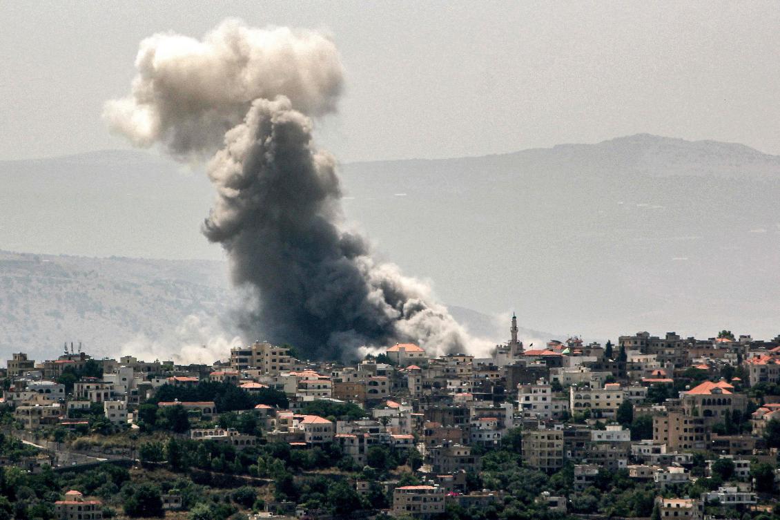 Smoke billows during Israeli bombardment on the village of Khiam in south Lebanon near the border with Israel on Jun. 19, 2024. (AFP)