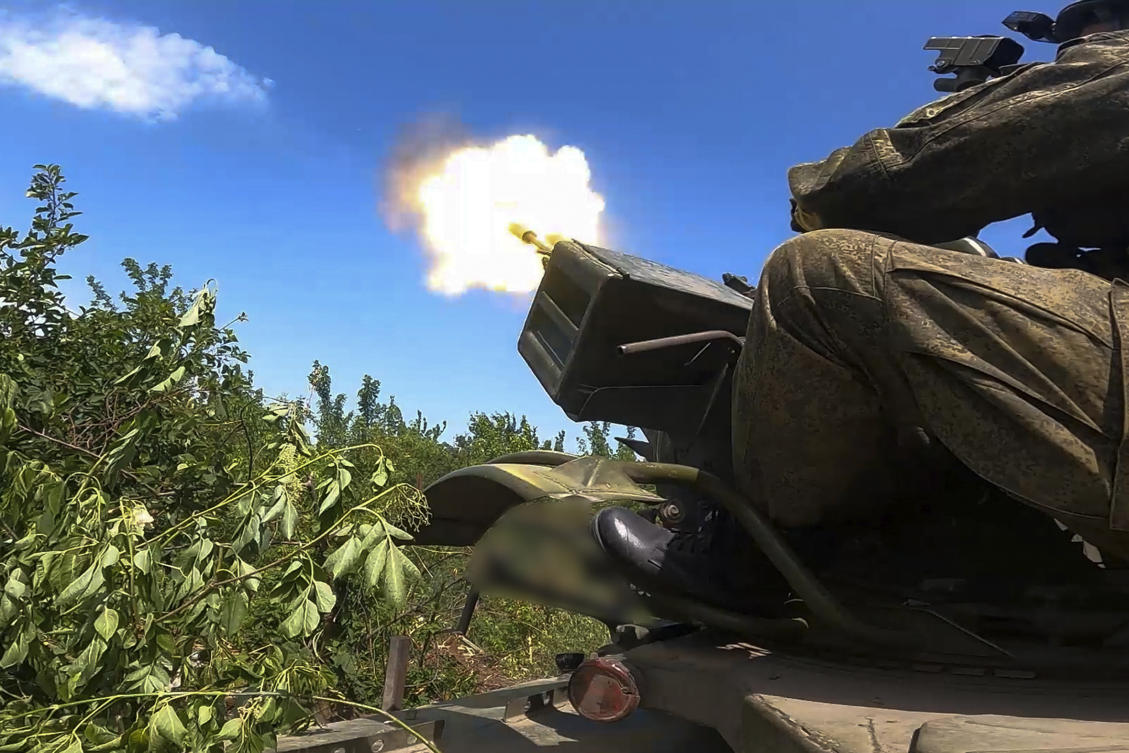In this photo released by the Russian Defense Ministry Press Service on Friday, June 21, 2024, Russian soldiers fire an anti-aircraft gun at an undisclosed location in Ukraine. (AP)