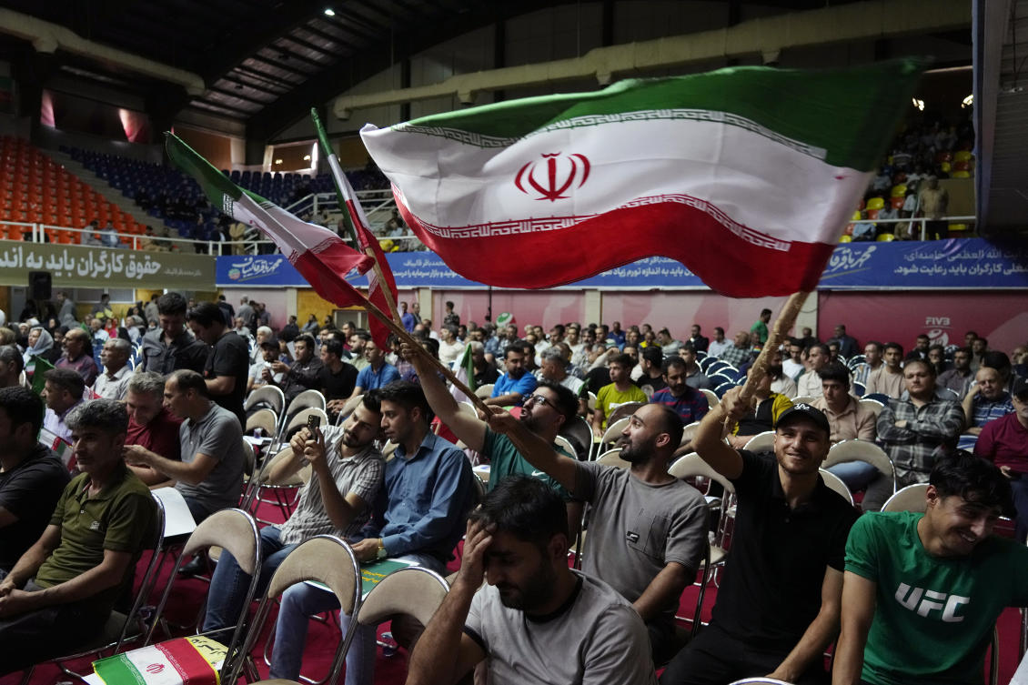 The election comes as Iran grapples with economic pressures, international sanctions and enforcement of the compulsory headscarves for women. (AP)