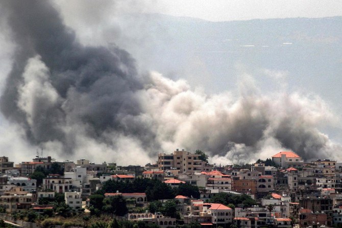 Smoke billows during Israeli bombardment on the village of Khiam in south Lebanon near the border with Israel on Jun. 8, 2024. (AFP)