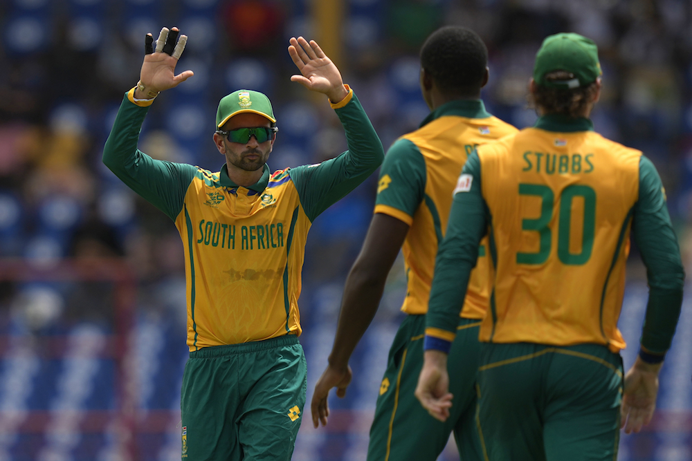 South Africa players celebrate the dismissal of England's Liam Livingstone during the ICC Men's T20 World Cup cricket match between England and South Africa at Darren Sammy National Cricket Stadium in Gros Islet, Saint Lucia. (AP)
