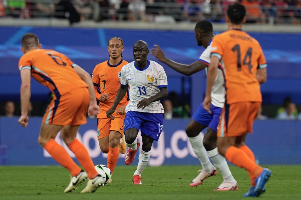 N'Golo Kante of France, center, runs at the Dutch defence. (AP)