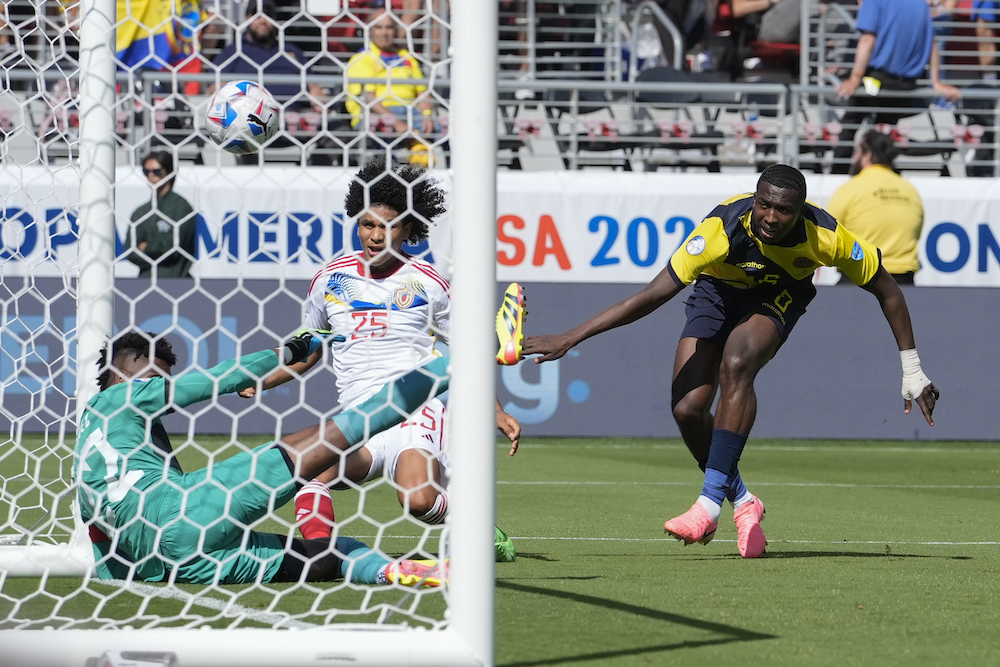Venezuela’s Eduard Bello, center, scores his side’s second goal against Ecuador during a Copa America Group B football match Saturday in Santa Clara, Calif. (AP)