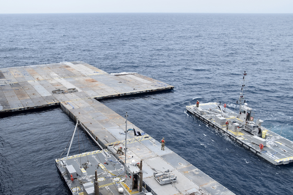 Construction work on the floating Joint Logistics Over-The-Shore (JLOTS) pier in the Mediterranean Sea. (File/AFP)