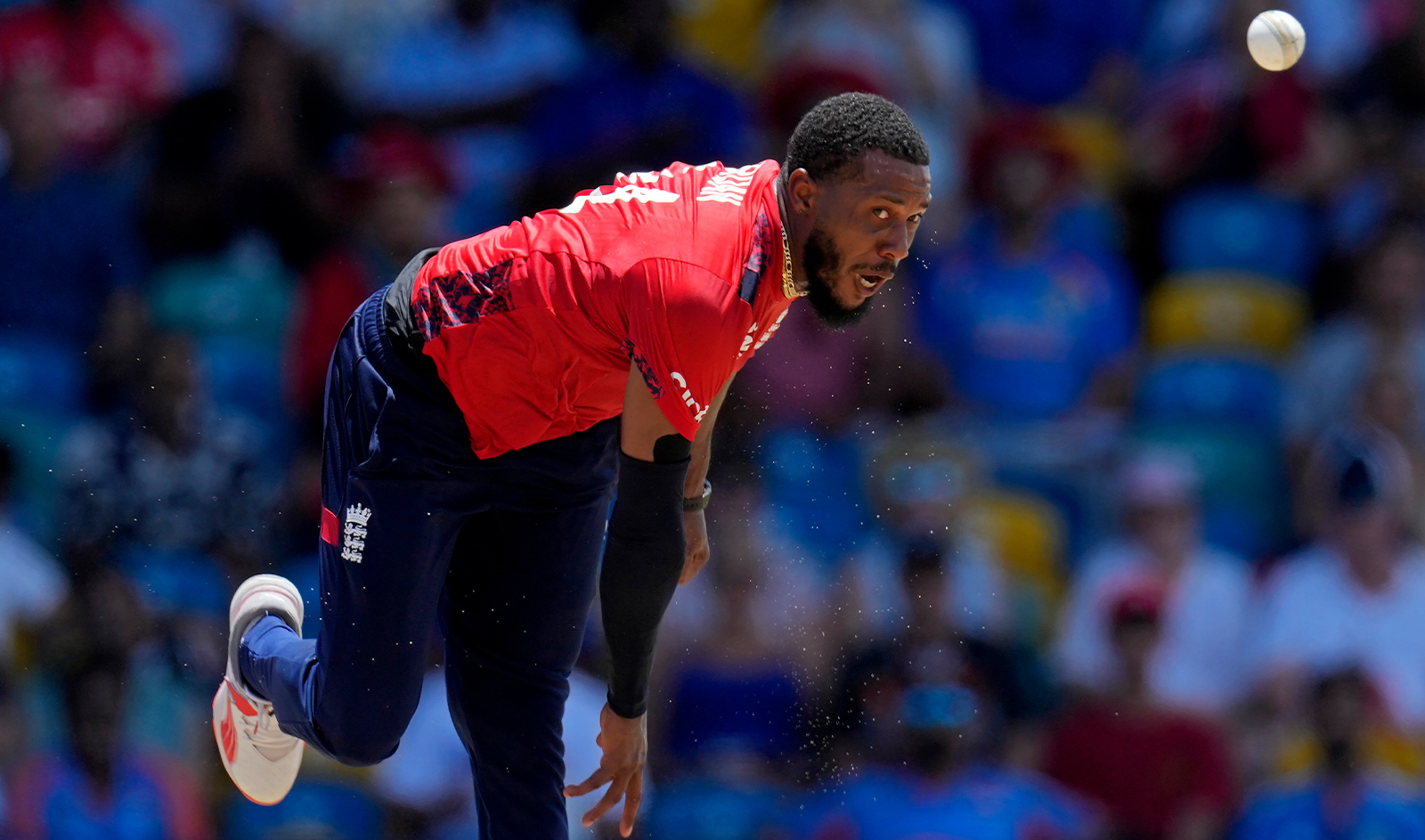 England's Chris Jordan celebrates after getting a hat-trick by dismissing United States' Saurabh Nethralvakar during the ICC Men's T20 World Cup cricket match between the United States and England at Kensington Oval in Bridgetown, Barbados, on June 23, 2024. (AP)