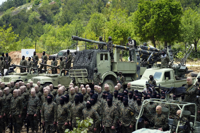 Hezbollah fighters carry out a training exercise in Aaramta village in the Jezzine District of southern Lebanon on May 21, 2023. (AP/File)