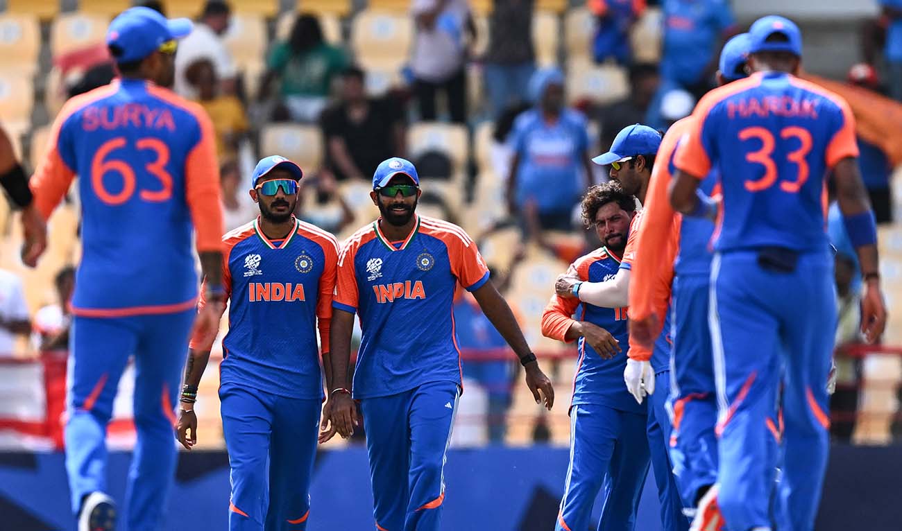 India players congratulate each other after defeating Australia during the ICC men's Twenty20 World Cup 2024 Super Eight cricket match between Australia and India at Daren Sammy National Cricket Stadium in Gros Islet, Saint Lucia on June 24, 2024. (AFP)