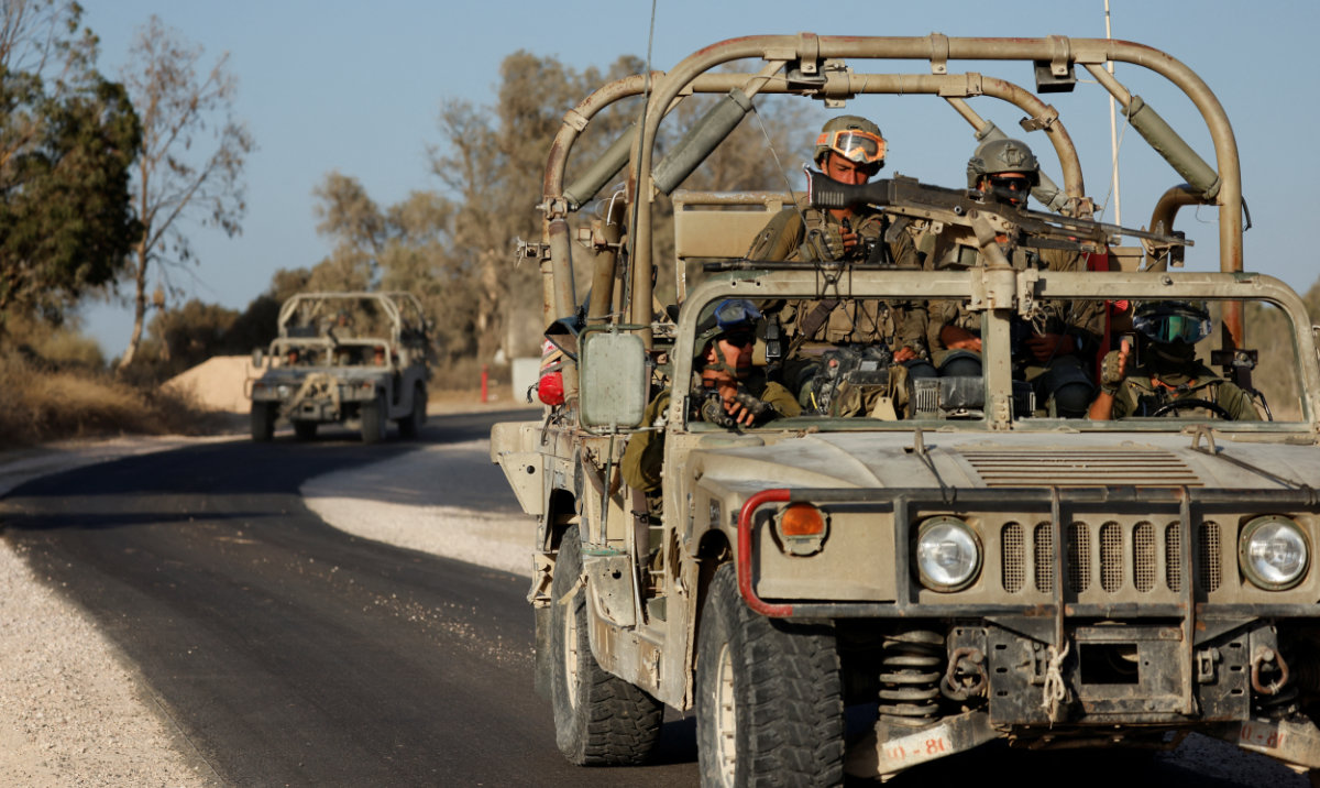 Israeli military jeeps manoeuver near the Israel-Gaza border, amid the Israel-Hamas conflict, in Israel, June 24, 2024. (Reuters)