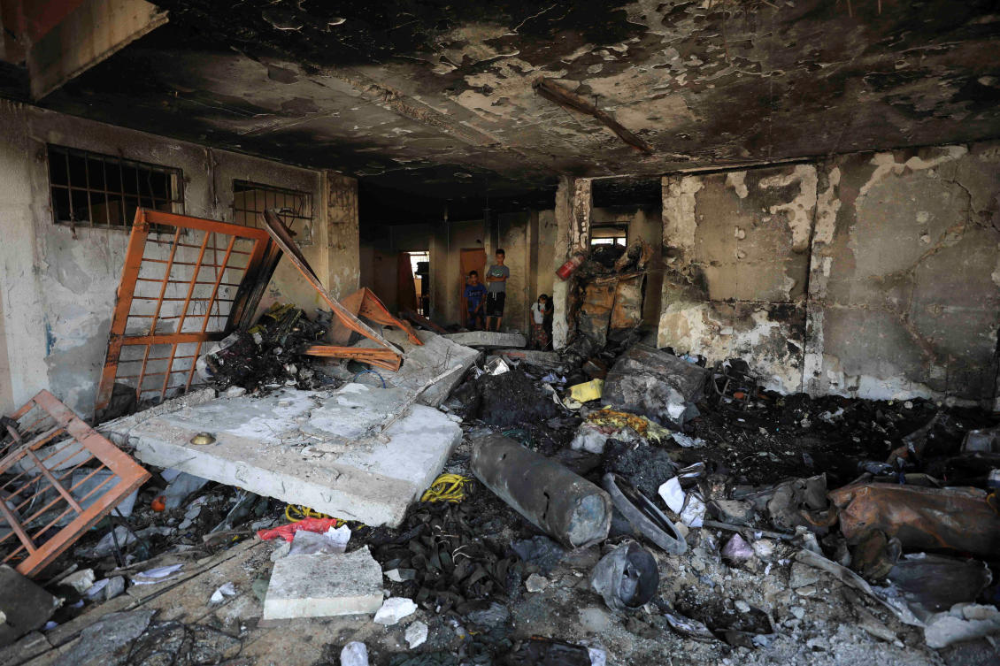 Palestinians inspect the damages at Abdulfattah Hamoud school where displaced people were taking refuge, following an Israeli strike, amid Israel-Hamas conflict, in Gaza City, June 25, 2024. (REUTERS)