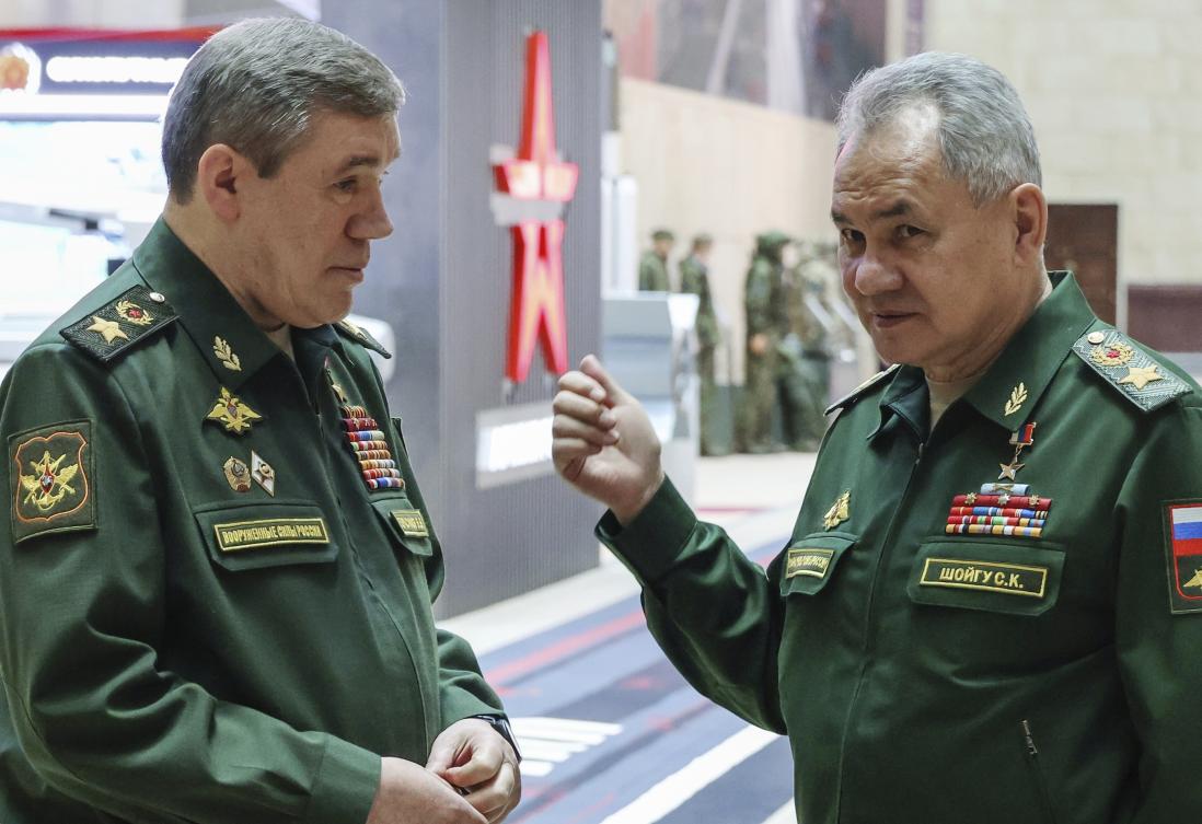 FILE — Russian Defense Minister Sergei Shoigu, right, gestures as he speaks to Russian Chief of General Staff Gen. Valery Gerasimov prior to a meeting Russian President Vladimir Putin with the top military brass in Moscow. (AP)
