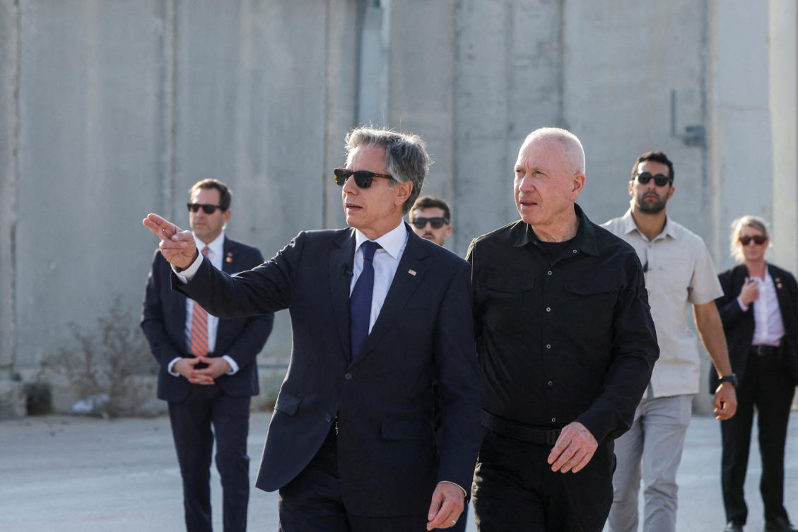 FILE PHOTO: US Secretary of State Antony Blinken gestures as he walks with Israeli Defense Minister Yoav Gallant, at the Kerem Shalom border crossing, Israel, May 1, 2024. (REUTERS)