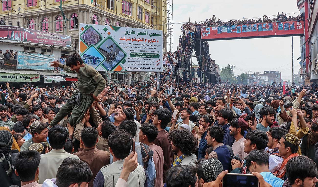 Afghan fans celebrate Afghanistan's win against Bangladesh during super eight match at the ICC T20 Cricket World Cup 2024, in Khost on June 25, 2024. (AFP)