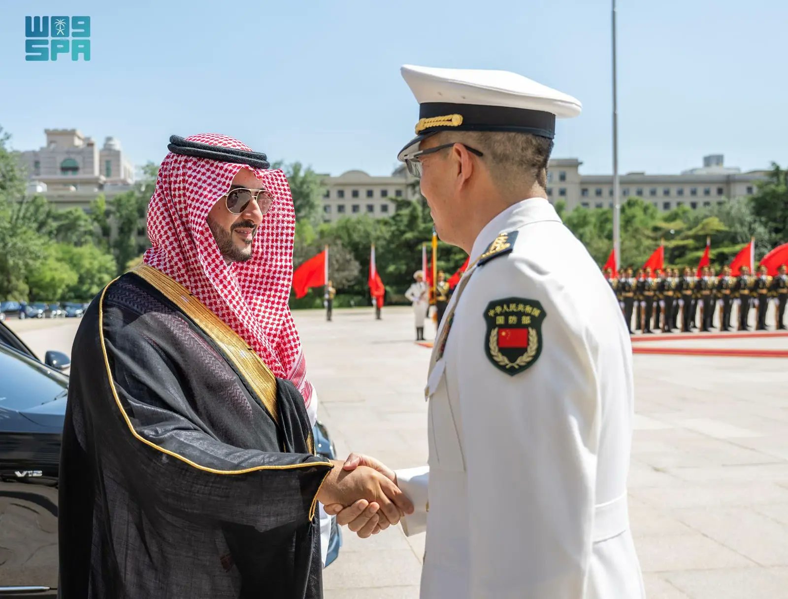 Saudi Defense Minister Prince Khalid bin Salman is received by his Chinese counterpart Dong Jun in Beijing on Tuesday. (SPA)
