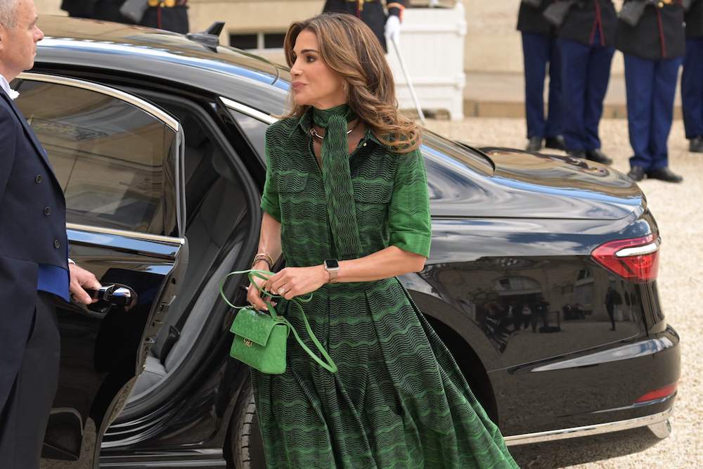 Jordan’s Queen Rania wowed in an Elie Saab outfit on Monday as she accompanied her husband King Abdullah II on a visit to Paris for a meeting with French President Emmanuel Macron and his wife, Brigitte. (AFP)