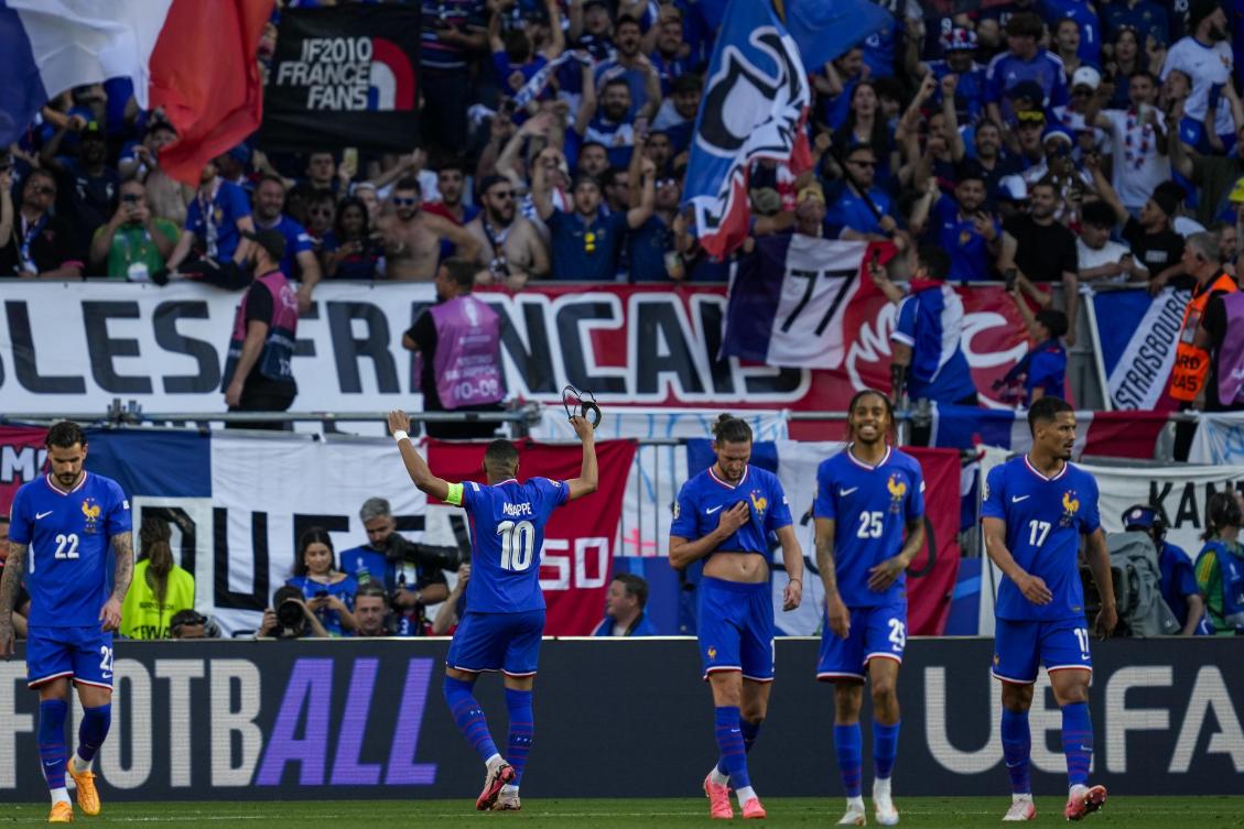 Kylian Mbappe of France celebrates after scoring a penalty kick during their Group D match against Poland at the Euro 2024 tournament in Dortmund on Jun. 25, 2024. (AP)