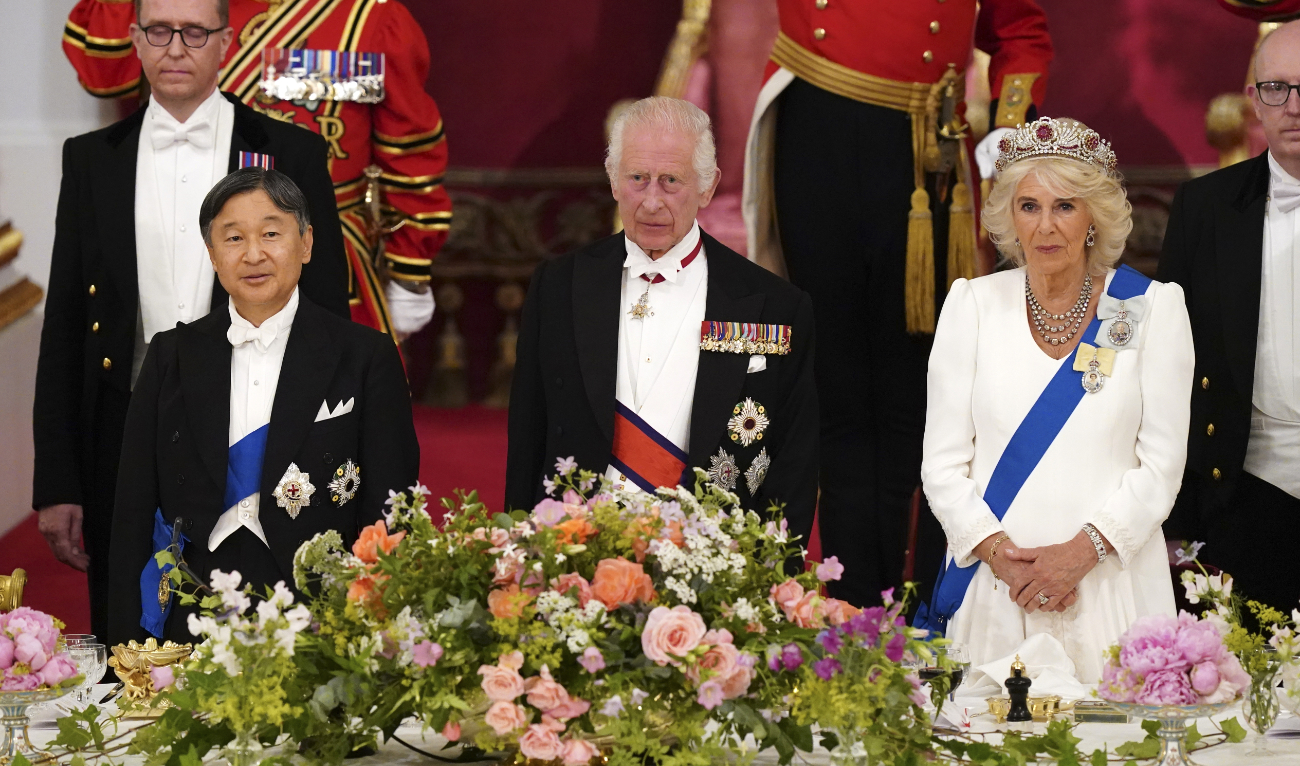 Britain’s King Charles III, center, Queen Camilla and Japan’s Emperor Naruhito attend a State Banquet in London, Tuesday, June 25, 2024. (AP)