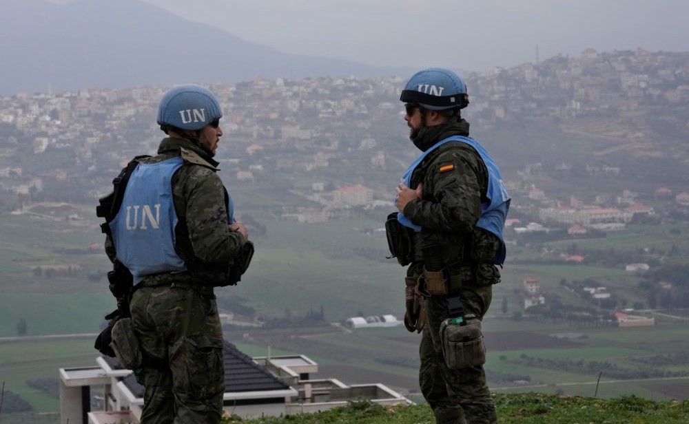 Spanish UN peacekeepers stand on a hill overlooking the Lebanese border villages with Israel in Marjayoun town, Jan. 10, 2024. (AP Photo)