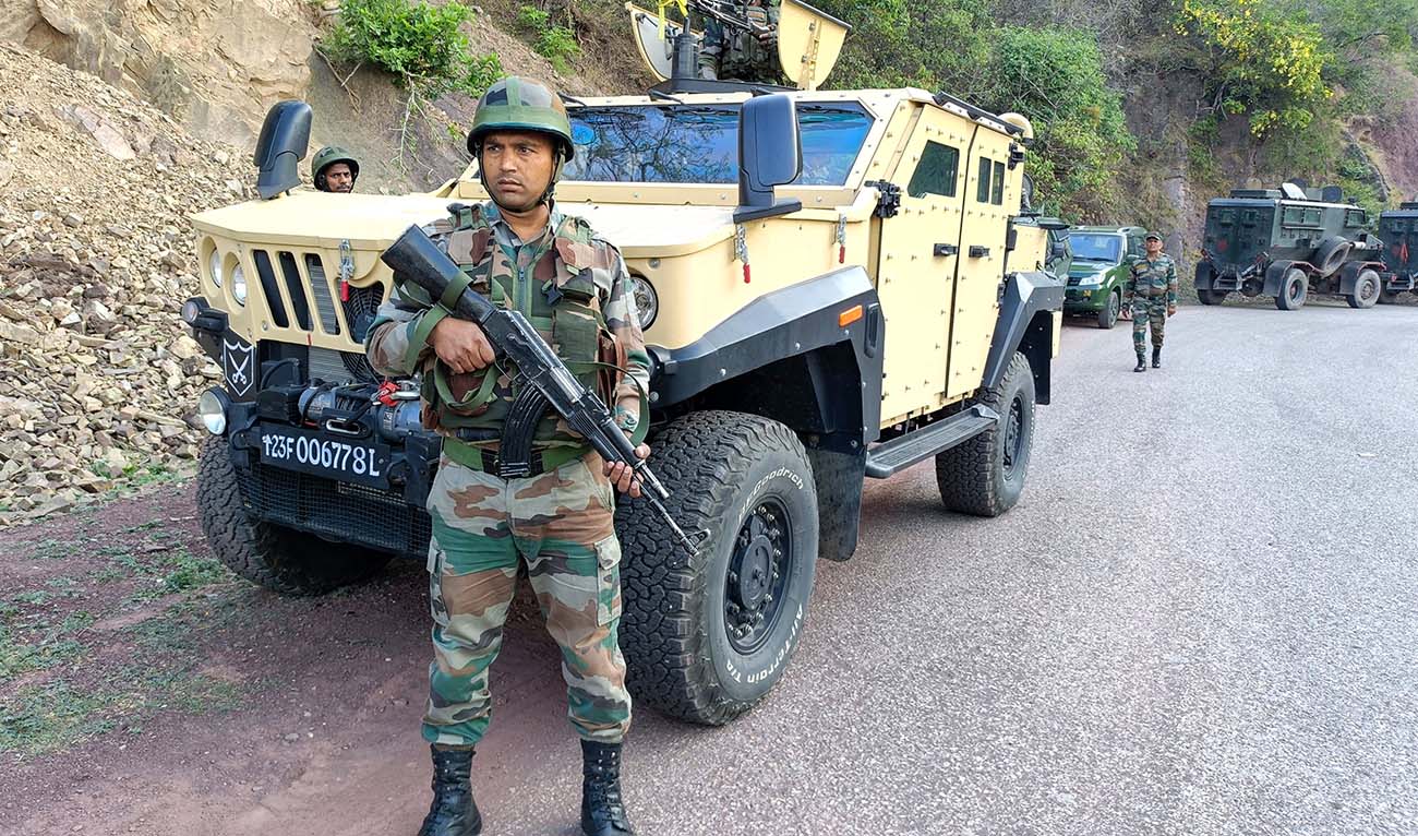 Indian army personnel look on during a search operation in Reasi on June 10, 2024, after gunmen in Kashmir ambushed the bus packed with Hindu pilgrims. (AFP/File)